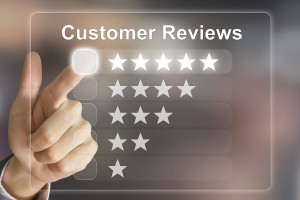 business hand clicking customer reviews on virtual screen interface