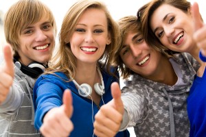 bigstockphoto_Teens_With_Thumbs_Up_6006256