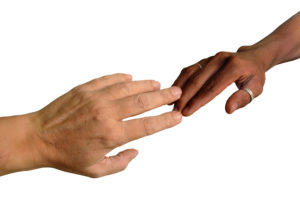 bigstockphoto_African_And_Caucasian_Fingers__4307946